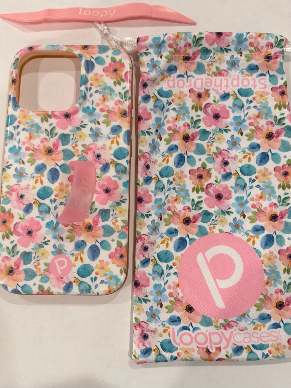iPhone 16 ProLoopy Case Floral Phone Case with Pink Loop Grip and Matching Pouch